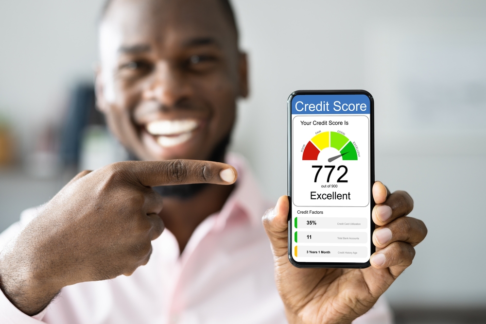 Man showing his credit score